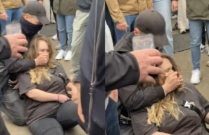 Nieuwe beelden: Agent snoert damschreeuwer snoeihard de mond tijdens Dodenherdenking