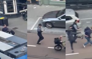 Jongen jat telefoon van Oranje-fan, Oranje-fan wil telefoon terug maar wordt belaagd