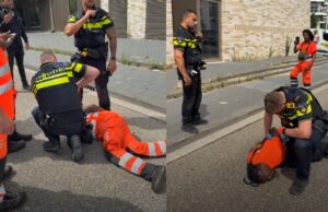 Woede door aanhouding in Amsterdam met kermende man op de grond in de boeien